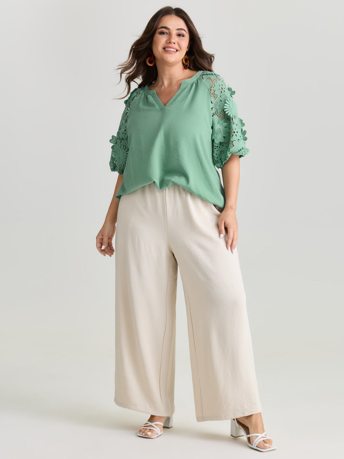 3D Floral Sleeve Spliced Flowy Blouse