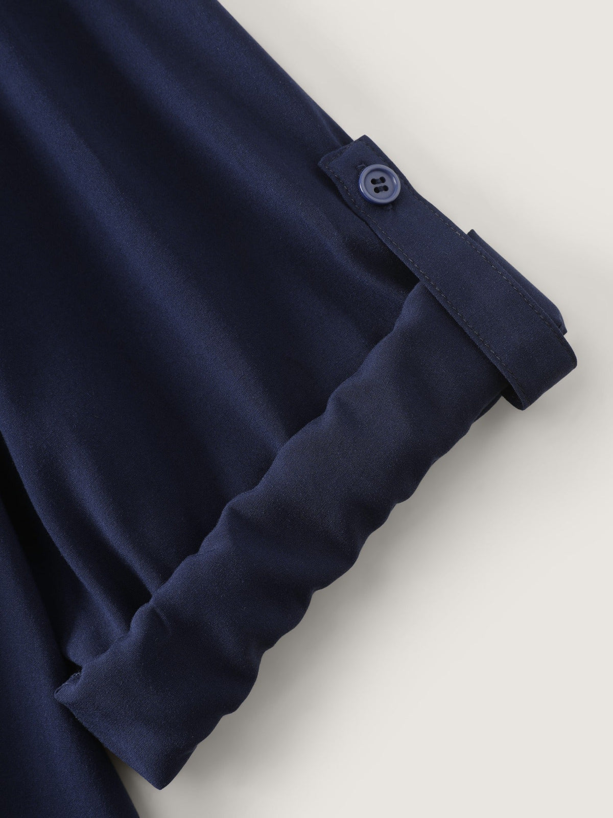 Roll‑Tab Sleeve Layered Asymmetrical Hem Blouse