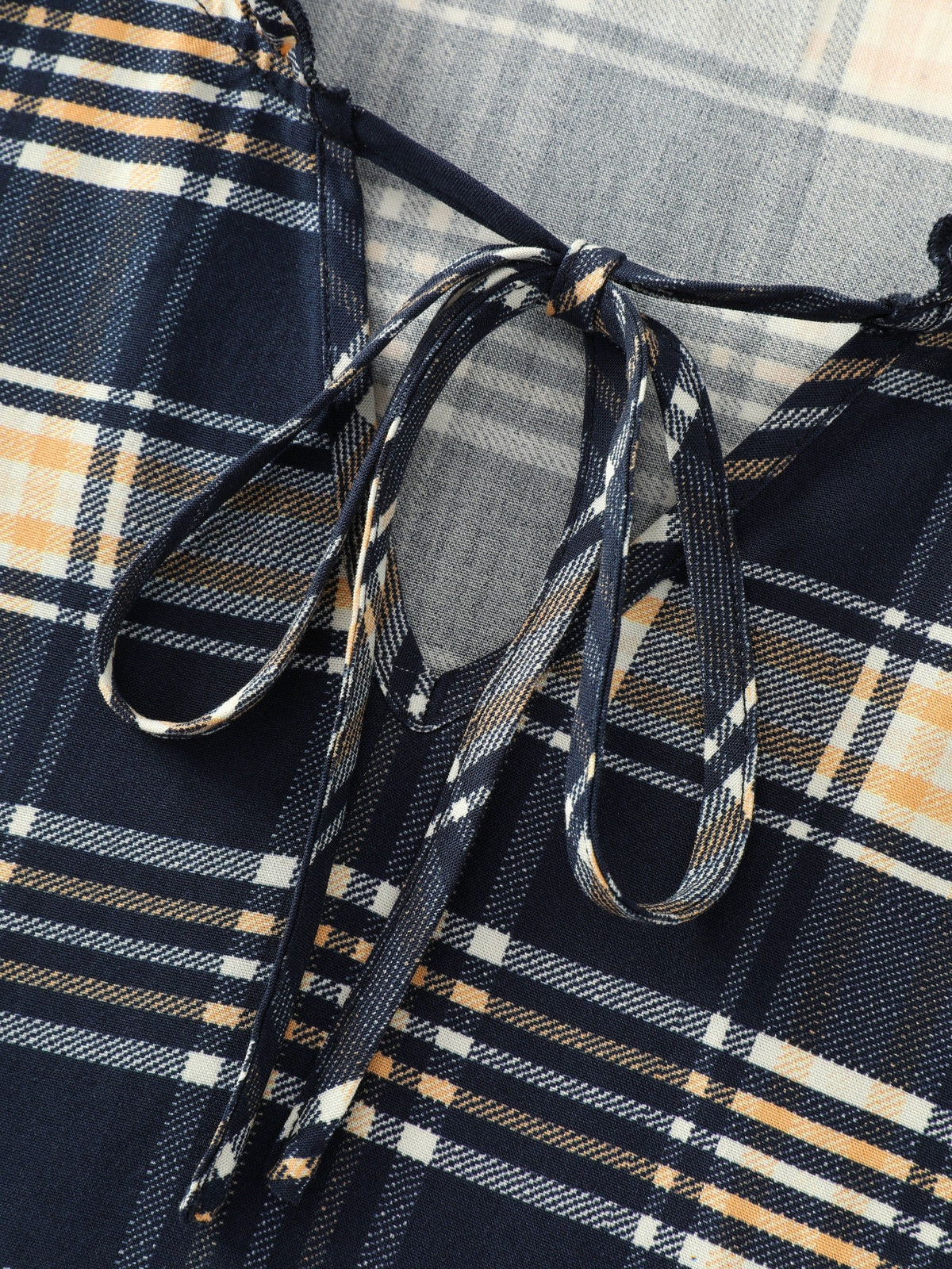 Plaid Ruffle Trim V‑Neck Tie‑Front Blouse