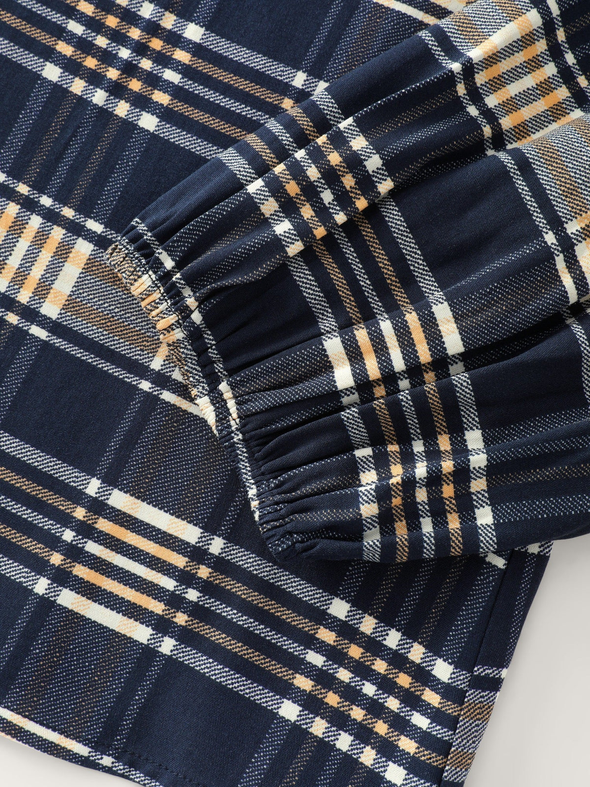 Plaid Ruffle Trim V‑Neck Tie‑Front Blouse