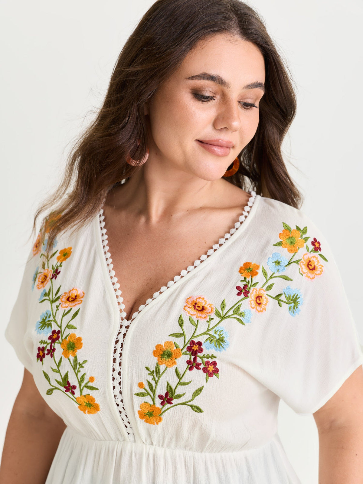 Floral Embroidered Neckline Flowy Blouse