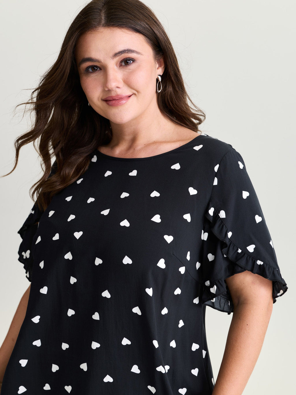 Ruffled Overlap Sleeve Heart Pattern Blouse