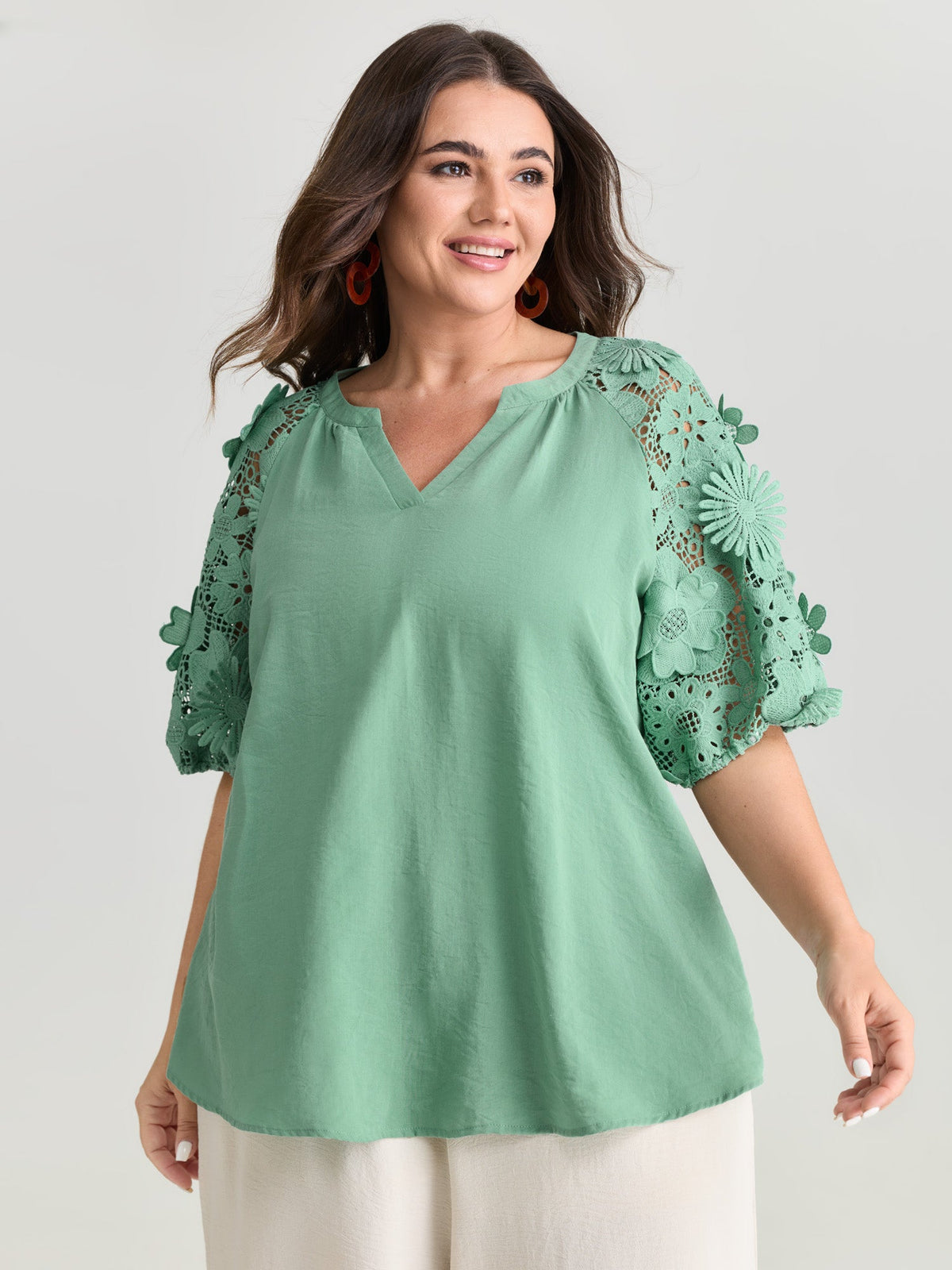 3D Floral Sleeve Spliced Flowy Blouse