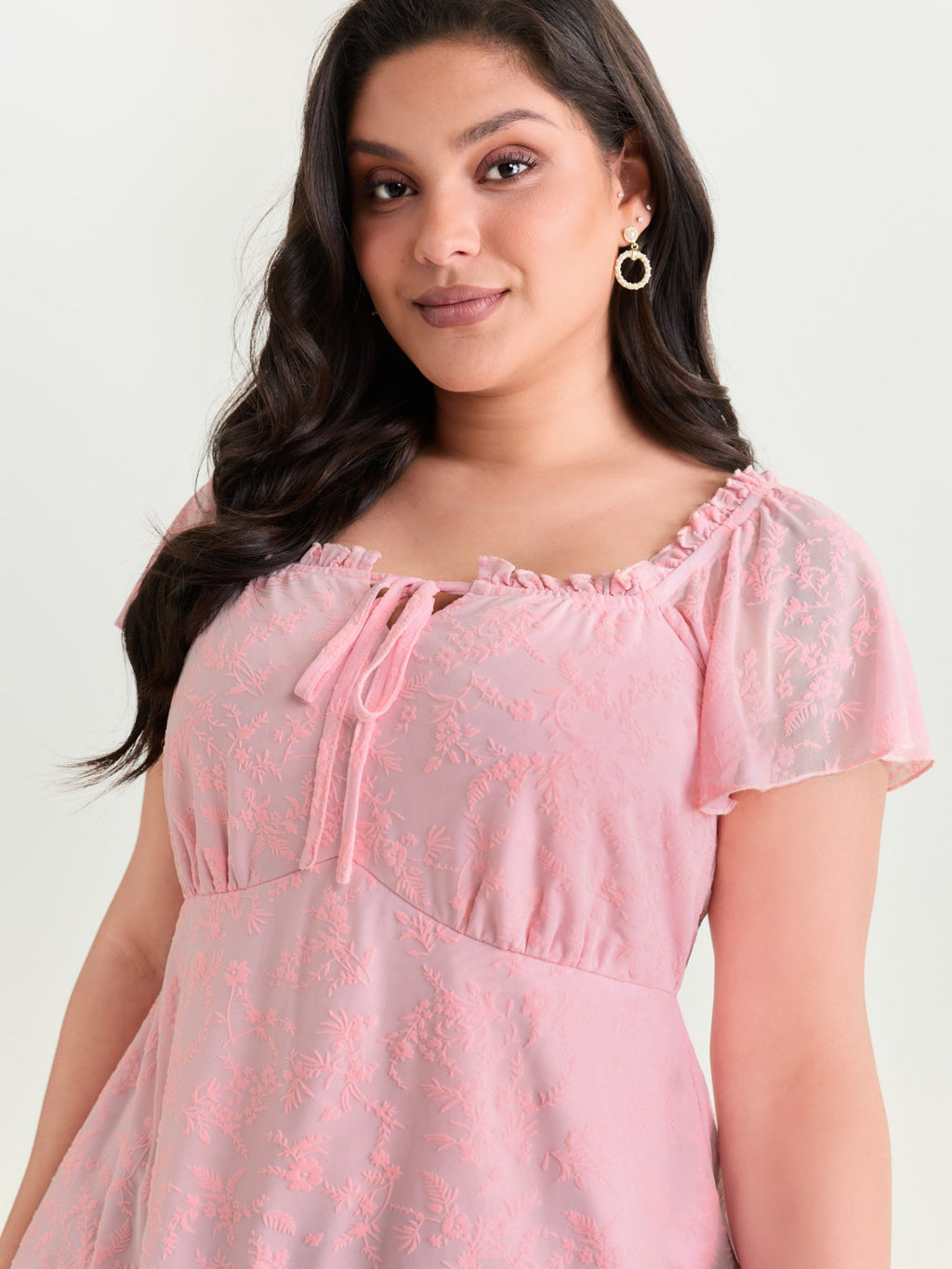 Flocked Floral Drawstring Neckline Knit Top