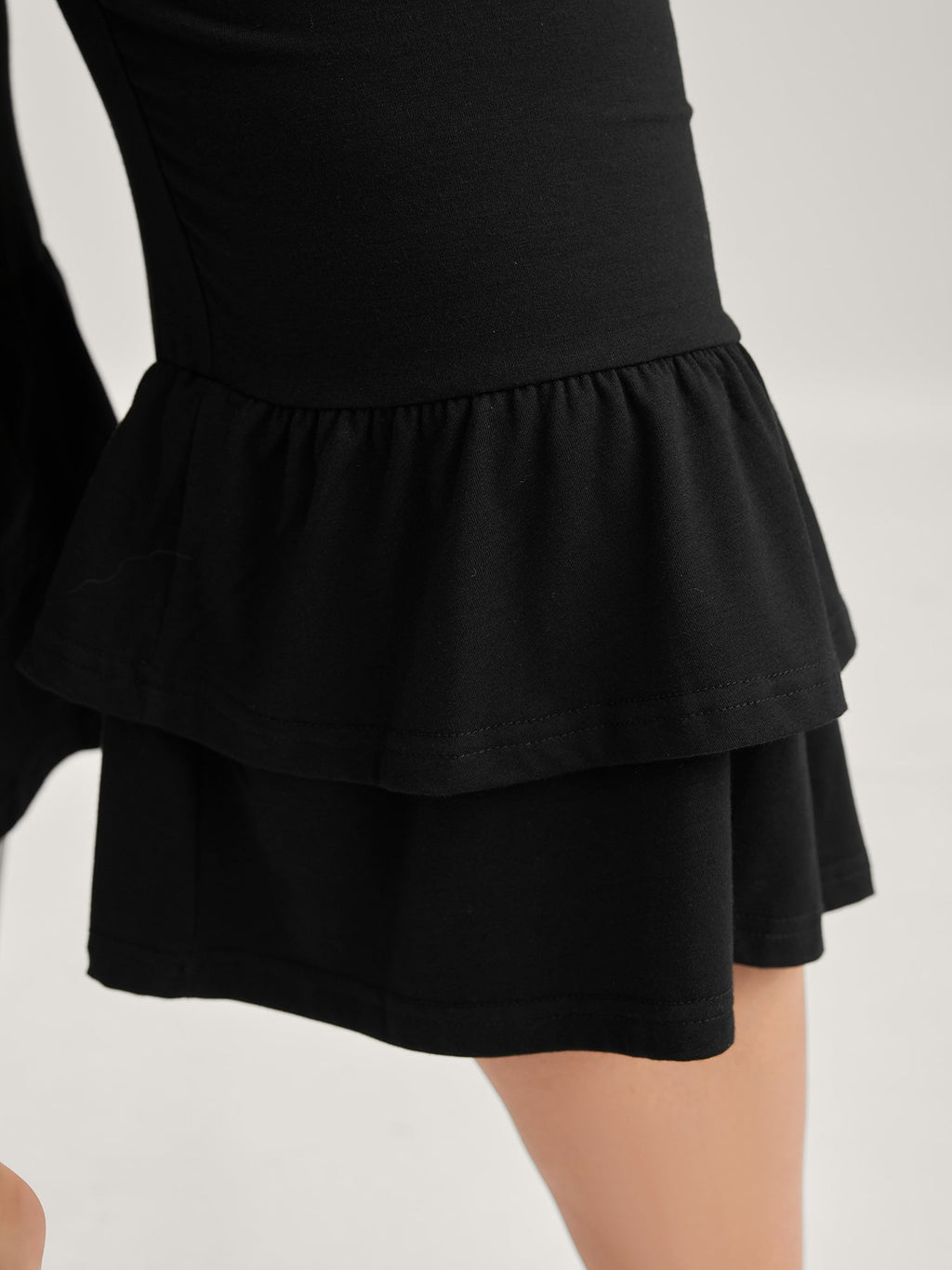 Layered Ruffled Flare Hem Capri Pants