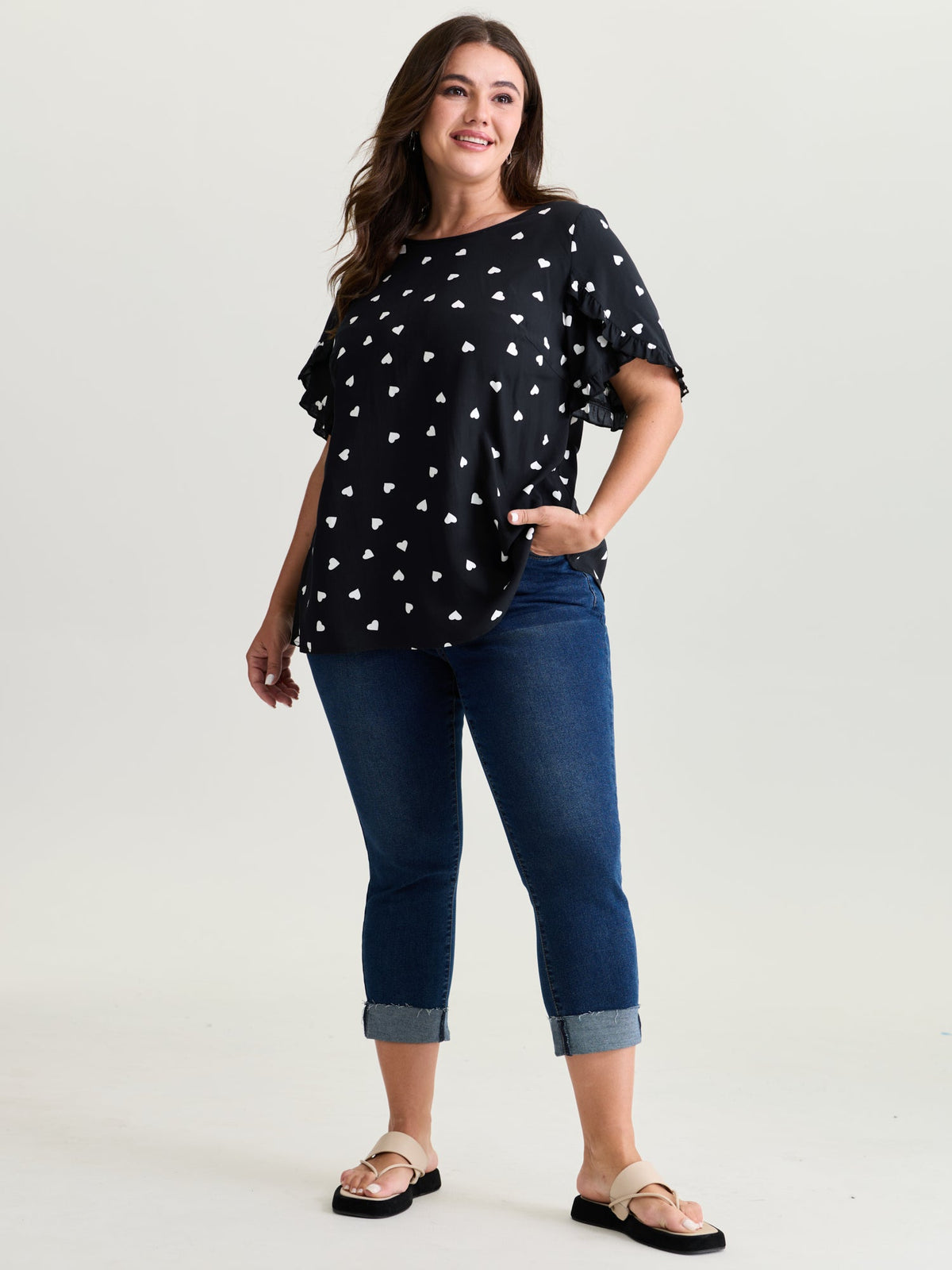 Ruffled Overlap Sleeve Heart Pattern Blouse